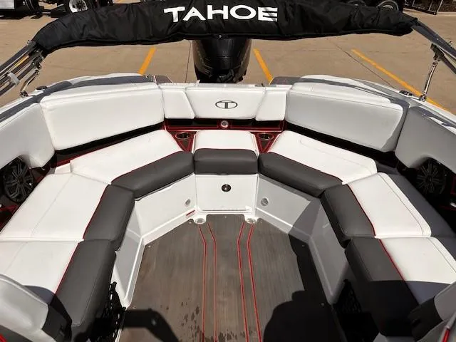 Slide: The Image of 2023 Tahoe 210 S Limited boat interior with white and gray seating. - 7