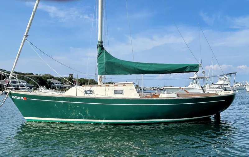 Slide: The Image of Green 1988 Quickstep 24 sailboat anchored in a scenic harbor. - 1