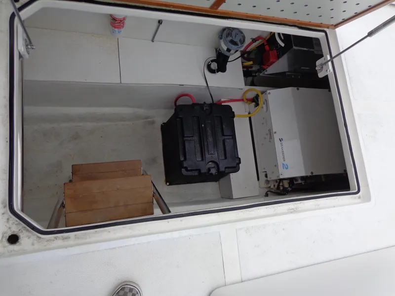 Slide: The Image of 2020 SeaPiper Pilothouse engine compartment with battery and equipment. - 33