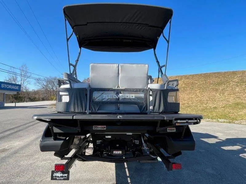 Slide: The Image of 2024 Sea-Doo Switch Cruise 21' 230HP pontoon boat, rear view with canopy. - 17