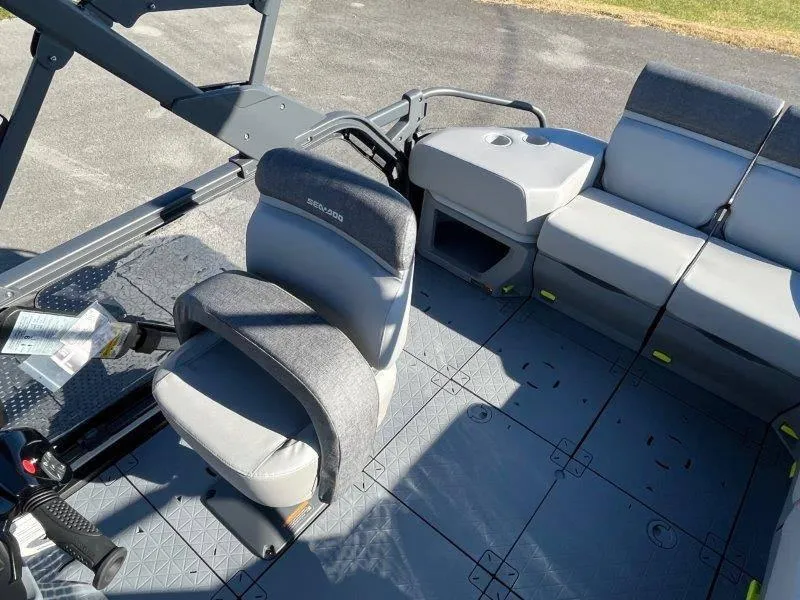 Slide: The Image of 2024 Sea-Doo Switch Cruise 21' 230HP interior with seating and controls. - 20