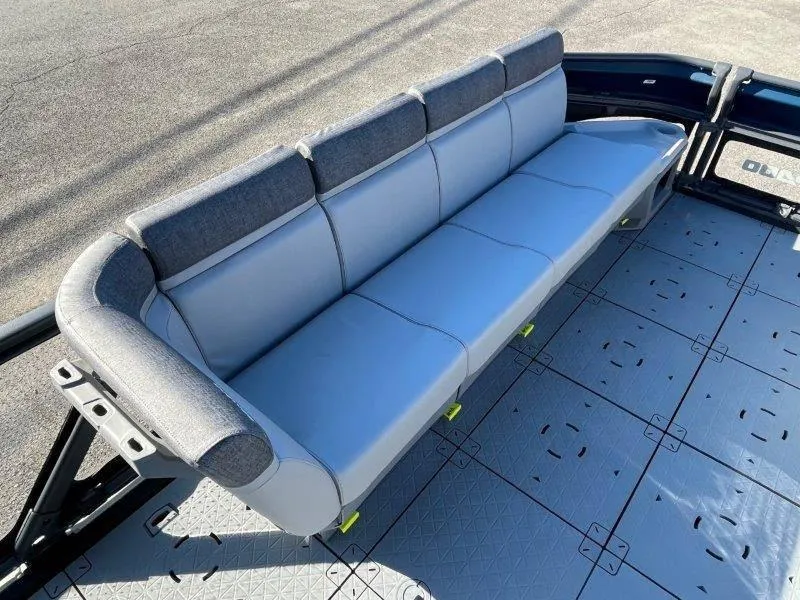 Slide: The Image of 2024 Sea-Doo Switch Cruise 21' 230HP boat interior with spacious seating. - 32