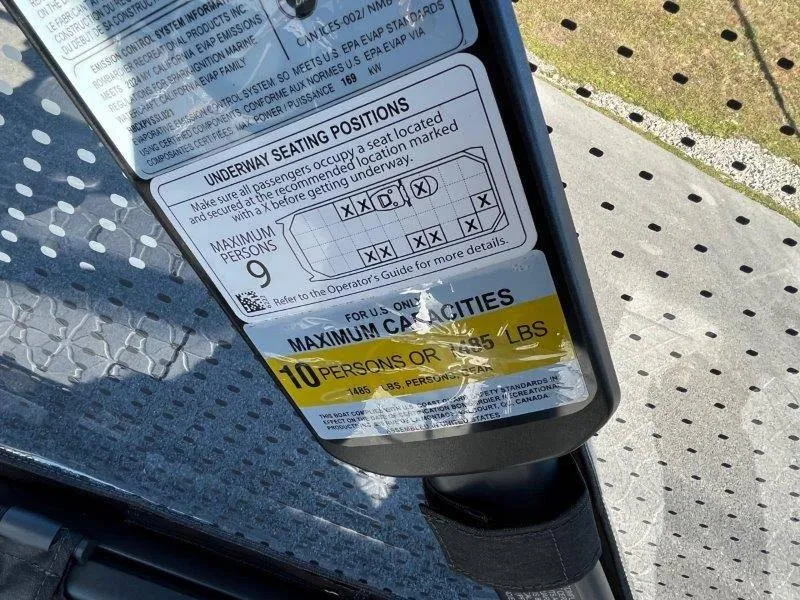 Slide: The Image of 2024 Sea-Doo Switch Cruise capacity label, maximum 10 persons or 1,805 lbs. - 33