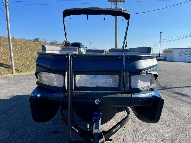 Slide: The Image of 2024 Sea-Doo Switch Cruise 21' 230HP pontoon boat, rear view on trailer. - 46