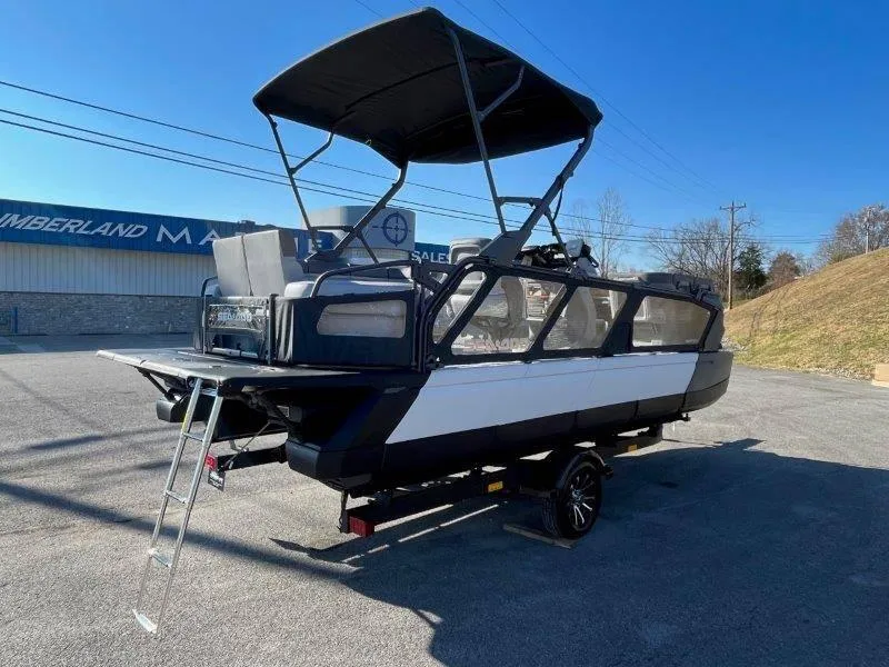 Slide: The Image of 2024 Sea-Doo Switch Cruise 21' 230HP pontoon boat with canopy and ladder. - 6