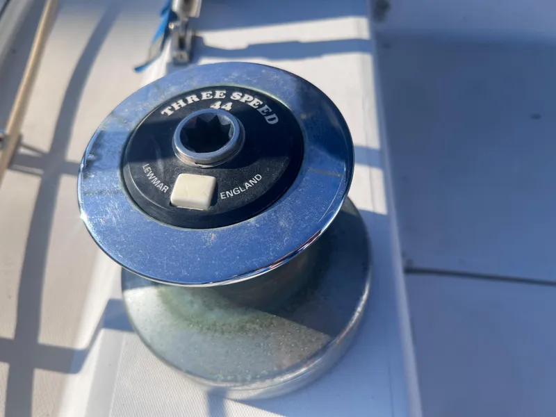 Slide: The Image of Three-speed winch on 1983 Catalina 36 sailboat deck, marked "Lewmar England." - 17