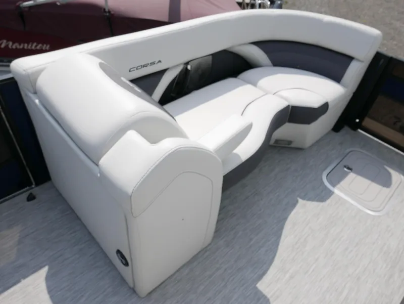 Slide: The Image of 2022 Barletta Corsa 23UC boat interior with plush seating and modern design. - 10
