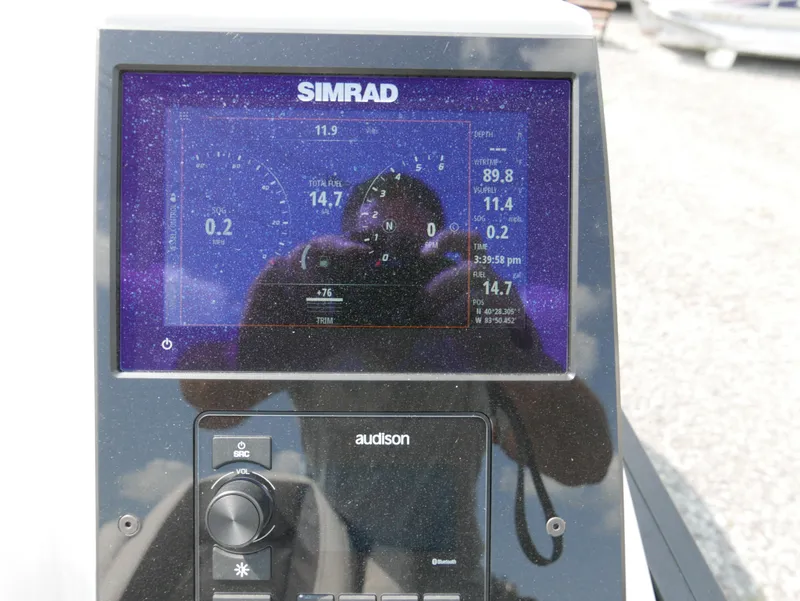 Slide: The Image of Simrad display on 2022 Barletta Corsa 23UC boat dashboard. - 23