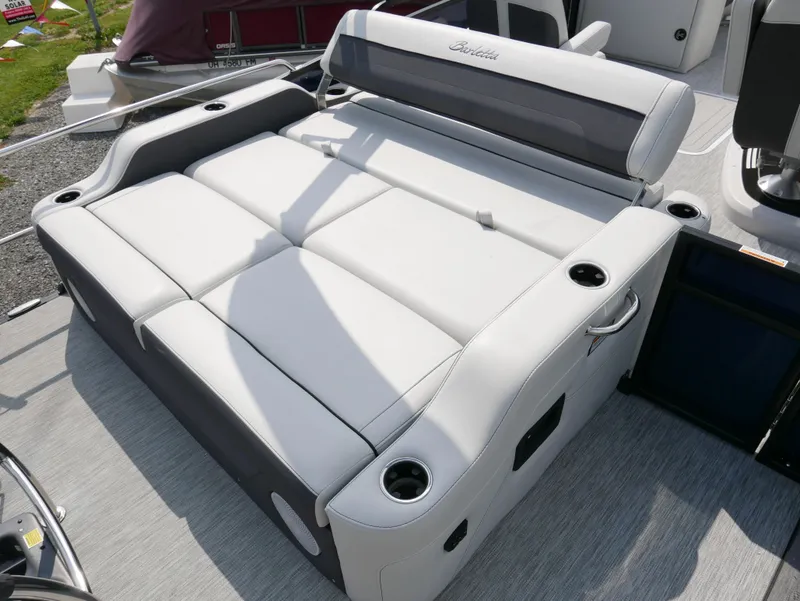 Slide: The Image of 2022 Barletta Corsa 23UC boat seating with cup holders and sleek design. - 31