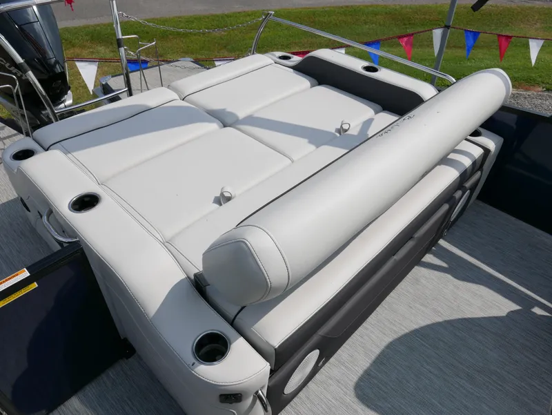 Slide: The Image of 2022 Barletta Corsa 23UC boat with luxurious seating and cup holders. - 32