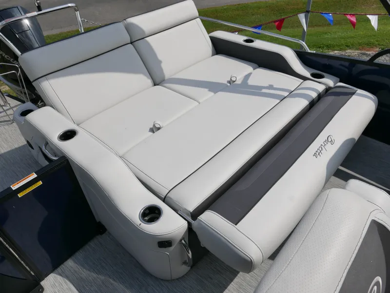 Slide: The Image of 2022 Barletta Corsa 23UC boat with luxurious white seating and cup holders. - 38