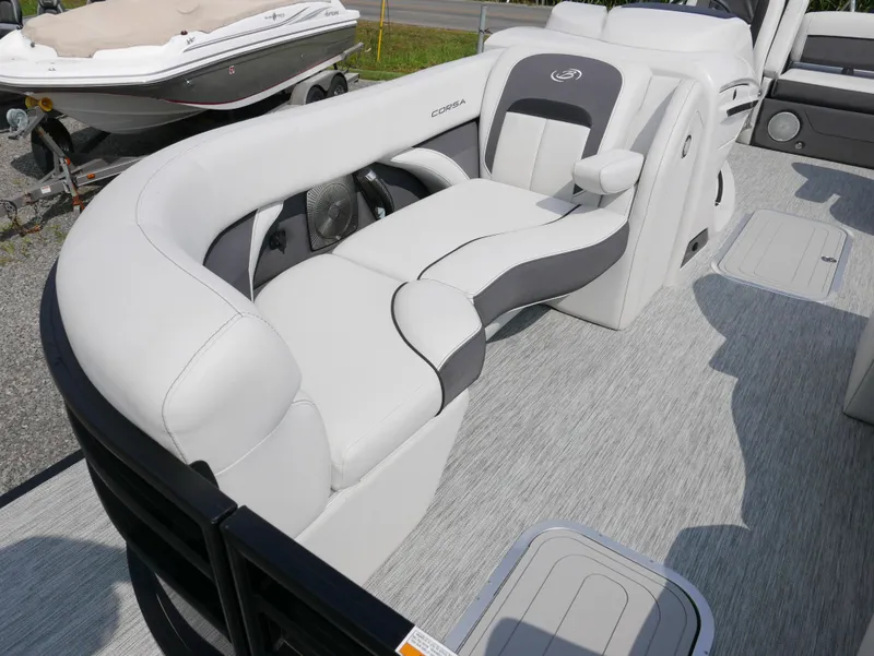 Slide: The Image of 2022 Barletta Corsa 23UC boat interior with luxurious seating and modern design. - 6