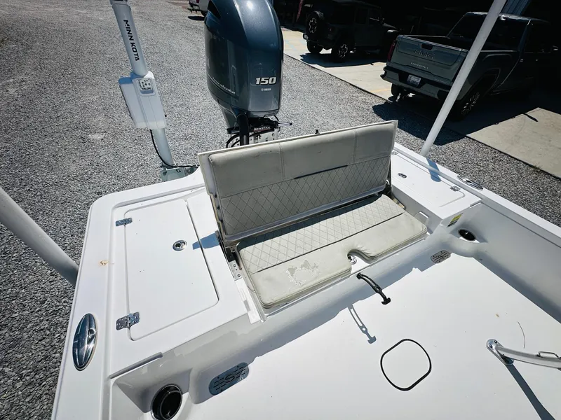 Slide: The Image of 2021 Sportsman Tournament 214 SBX Bay Boat with Yamaha 150 engine, rear seating view. - 12