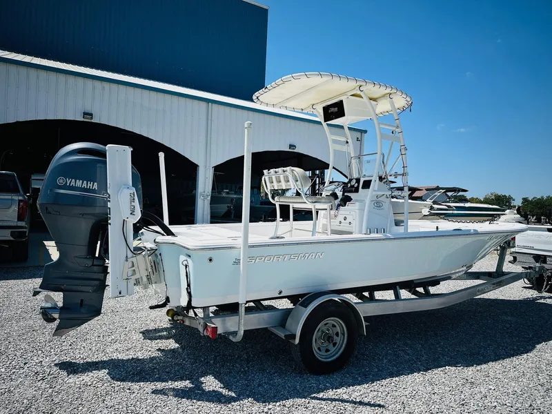 Slide: The Image of 2021 Sportsman Tournament 214 SBX Bay Boat with Yamaha engine on trailer. - 6