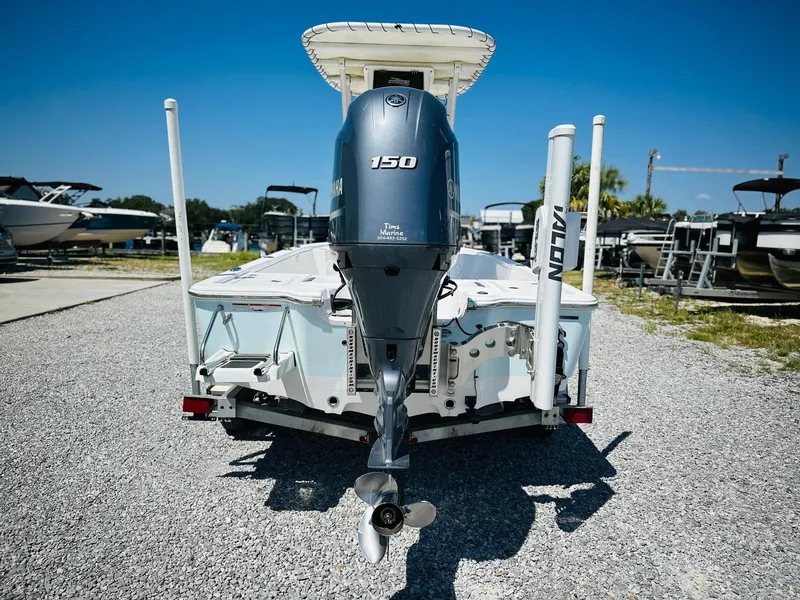 Slide: The Image of 2021 Sportsman Tournament 214 SBX Bay Boat with 150 HP engine, rear view. - 7