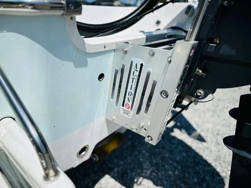Slide: The Image of 2021 Sportsman Tournament 214 SBX Bay Boat transom detail with Action bracket. - 8