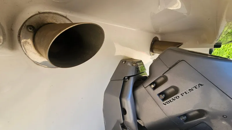 Slide: The Image of 2001 Reinell 240 C boat with Volvo Penta engine detail. - 21