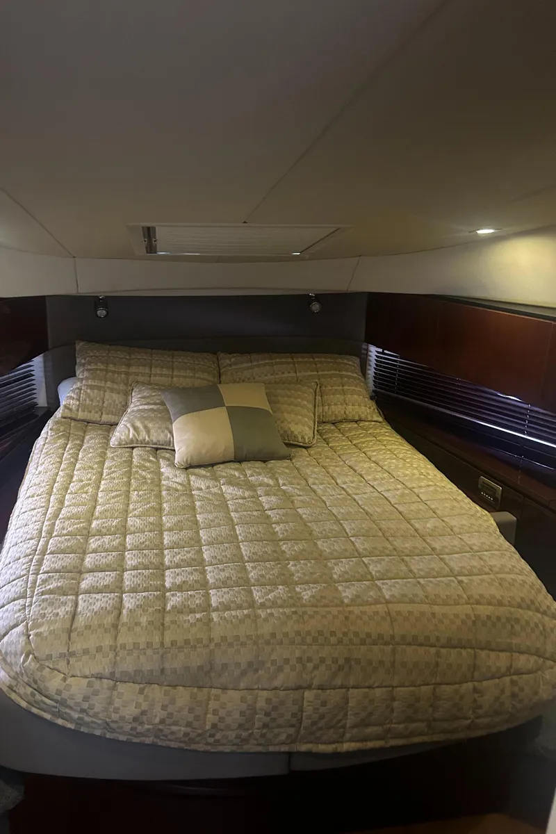 Slide: The Image of Luxurious bedroom interior of 2008 Sea Ray 47 Sedan Bridge yacht. - 10