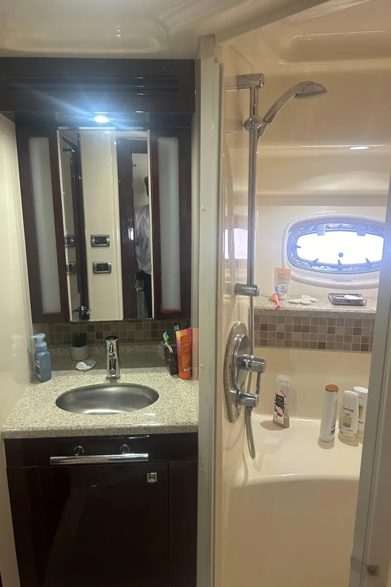 Slide: The Image of Luxurious bathroom in 2008 Sea Ray 47 Sedan Bridge yacht with modern fixtures. - 11