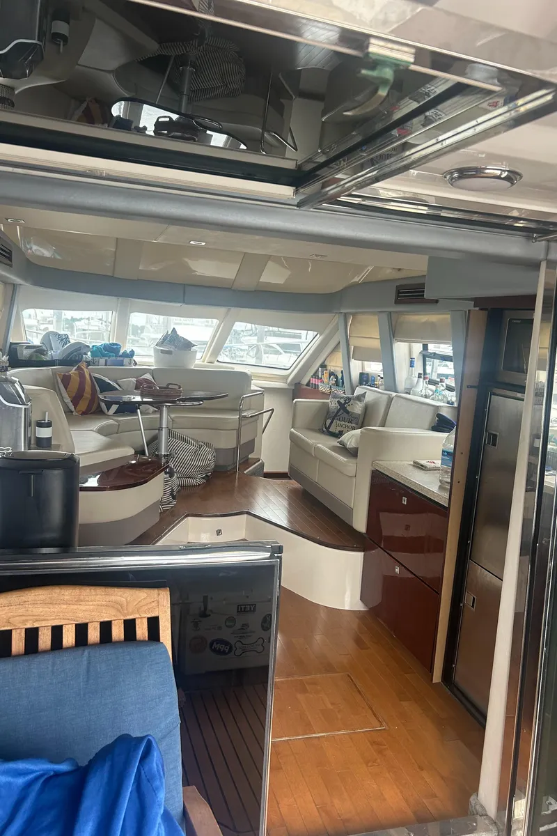 Slide: The Image of Interior of 2008 Sea Ray 47 Sedan Bridge yacht with luxurious seating and modern design. - 22
