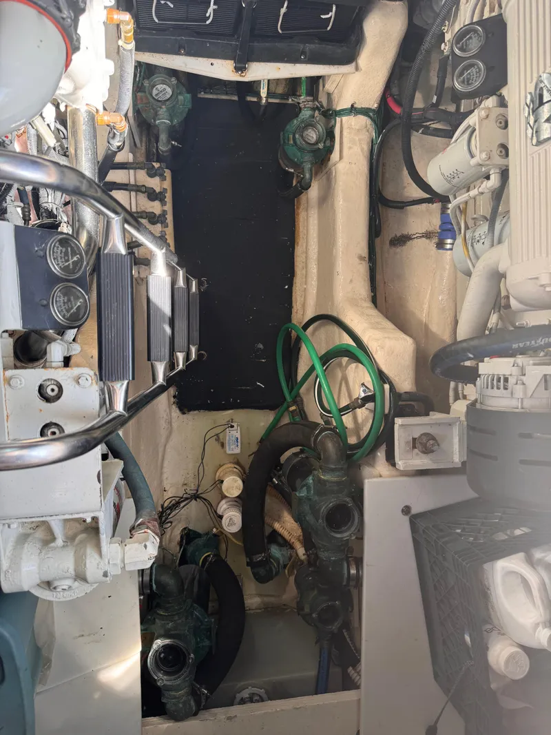 Slide: The Image of Engine room of 2008 Sea Ray 47 Sedan Bridge with mechanical components. - 4