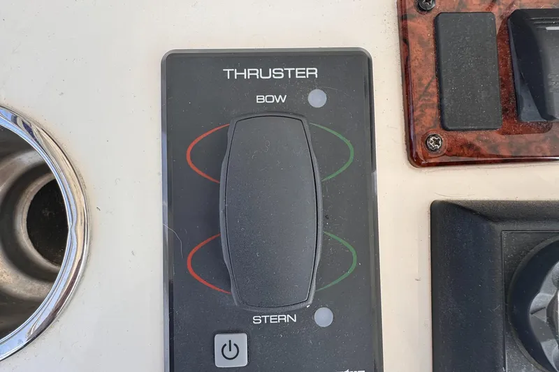 Slide: The Image of 2008 Sea Ray 47 Sedan Bridge thruster control panel. - 9