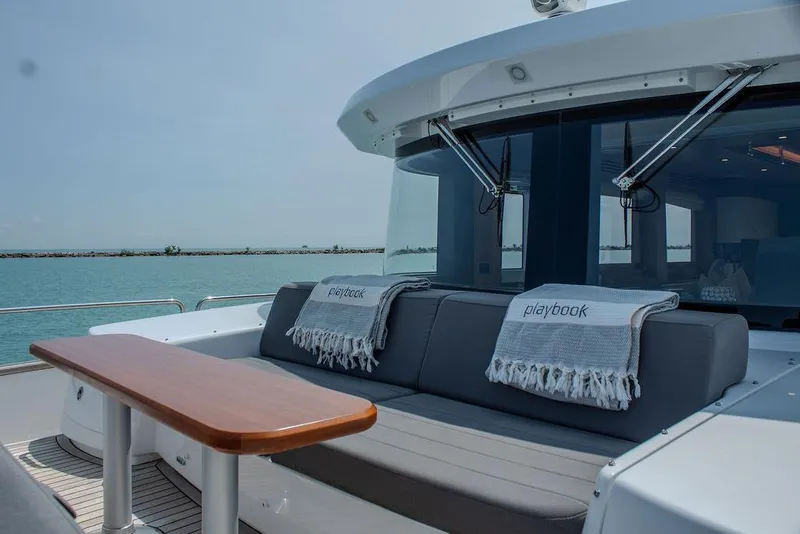 Slide: The Image of Sirena 58 Flybridge 2022 yacht with outdoor seating and ocean view. - 43