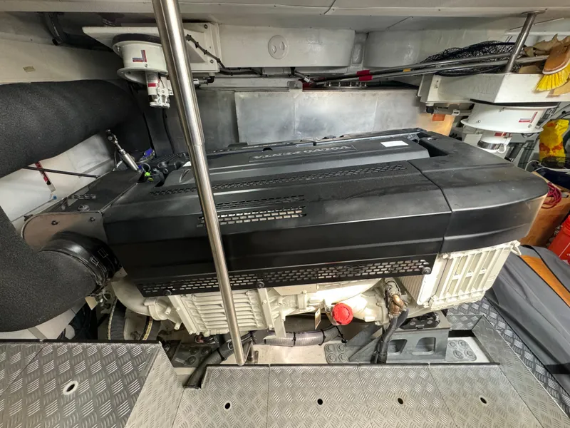 Slide: The Image of Engine room of 2022 Sirena 58 Flybridge yacht, showcasing powerful machinery and components. - 49