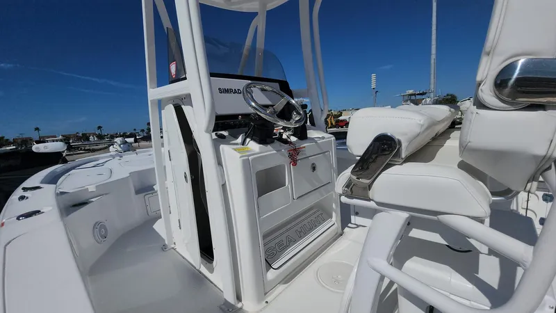 Slide: The Image of 2020 Sea Hunt BX 25 BR boat interior with steering console and seating. - 10