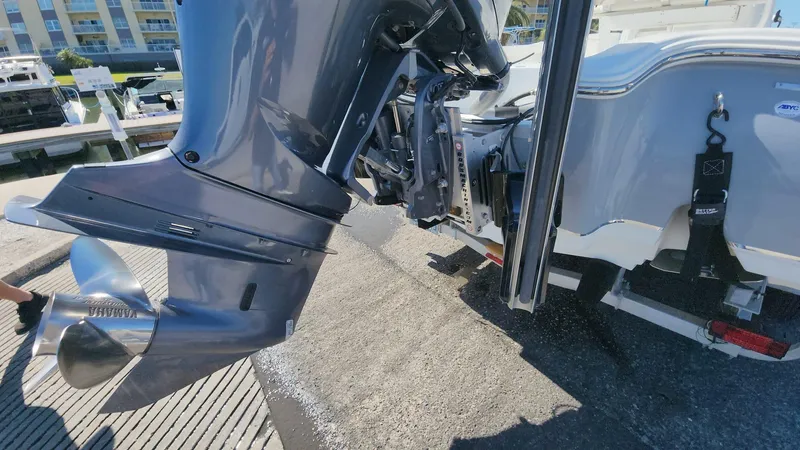 Slide: The Image of 2020 Sea Hunt BX 25 BR boat engine and propeller at dockside. - 11