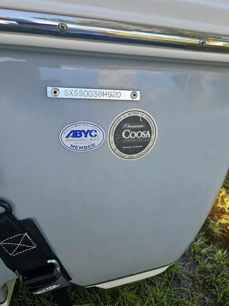 Slide: The Image of 2020 Sea Hunt BX 25 BR boat with ABYC and Coosa certification badges. - 22
