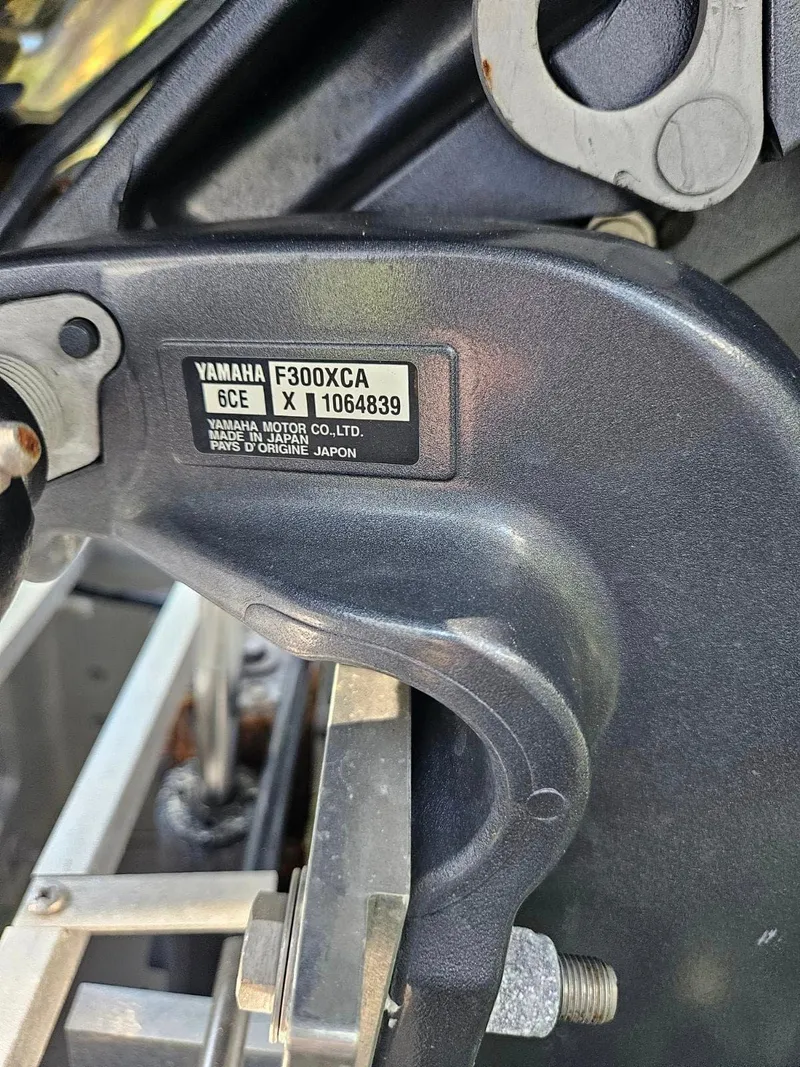 Slide: The Image of Close-up of Yamaha F300XCA engine part on 2020 Sea Hunt BX 25 BR boat. - 23