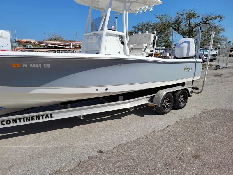 Slide: The Image of 2020 Sea Hunt BX 25 BR boat on trailer in outdoor setting. - 29