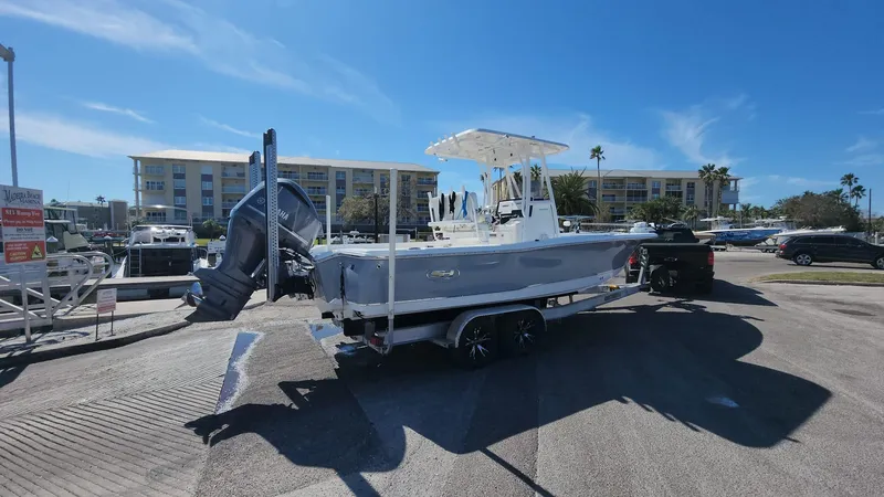 Slide: The Image of 2020 Sea Hunt BX 25 BR boat on trailer in sunny parking lot. - 33