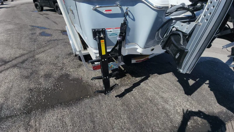 Slide: The Image of 2020 Sea Hunt BX 25 BR boat trailer hitch on asphalt surface. - 45