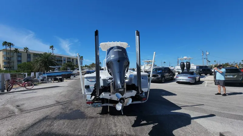Slide: The Image of 2020 Sea Hunt BX 25 BR boat on trailer in sunny parking lot. - 49