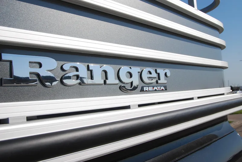 Slide: The Image of Close-up of 2024 Ranger Reata 220F logo on metallic surface. - 17