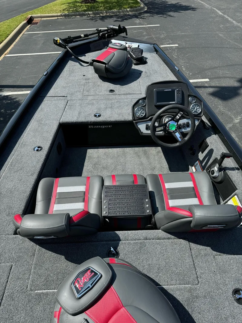 Slide: The Image of 2024 Ranger RT178C fishing boat interior with modern dashboard and seating. - 3