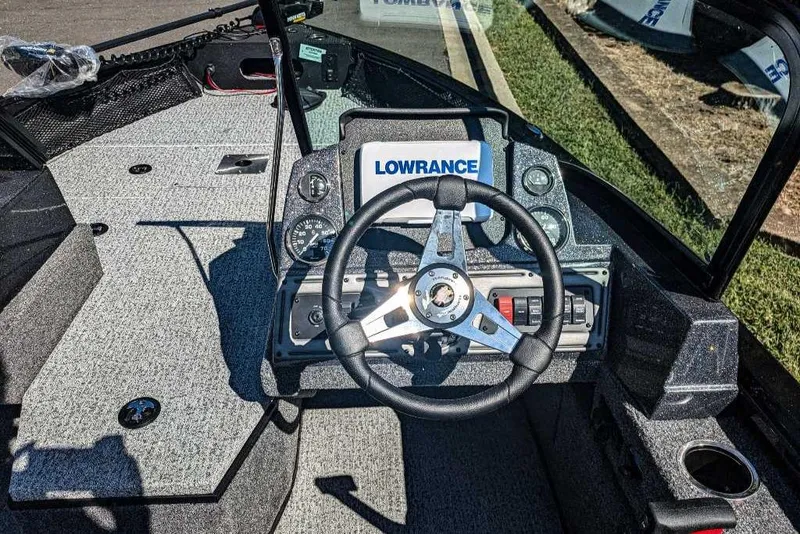 Slide: The Image of 2024 Ranger VS1682SC Angler boat dashboard with Lowrance navigation system. - 2