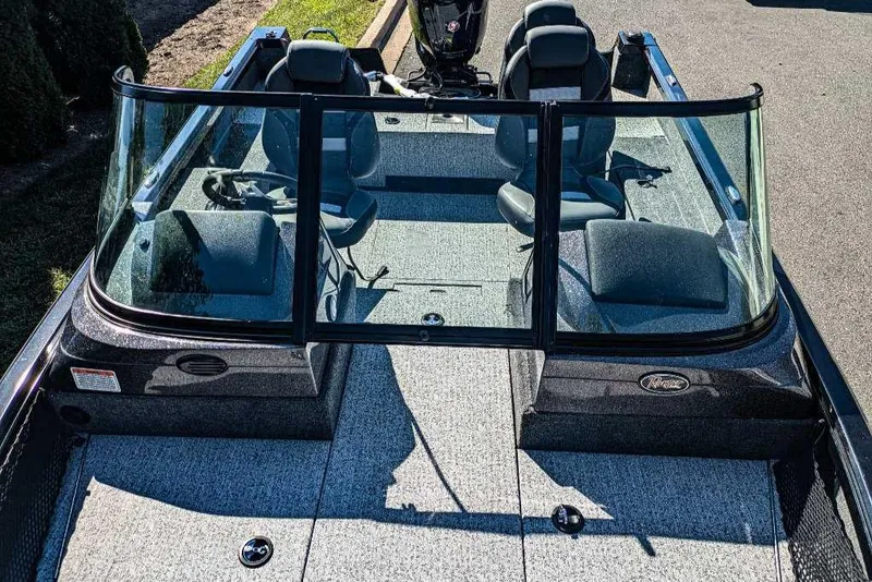 Slide: The Image of 2024 Ranger VS1682SC Angler boat interior with seating and windshield. - 3