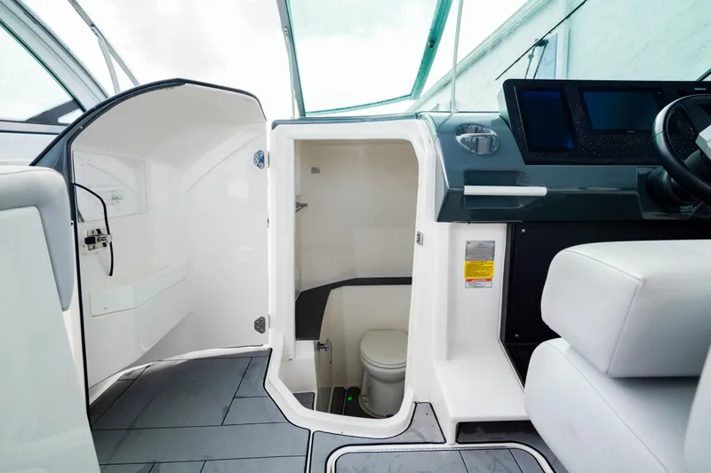 Slide: The Image of Interior view of 2022 Aviara AV32 OB boat with modern amenities. - 12