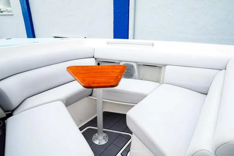 Slide: The Image of Luxurious seating area on 2022 Aviara AV32 OB boat with sleek white upholstery. - 2