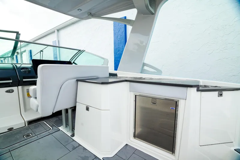 Slide: The Image of 2022 Aviara AV32 OB boat interior with sleek seating and modern amenities. - 20