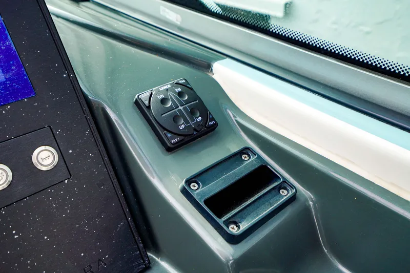 Slide: The Image of Control panel on 2022 Aviara AV32 OB boat dashboard. - 32