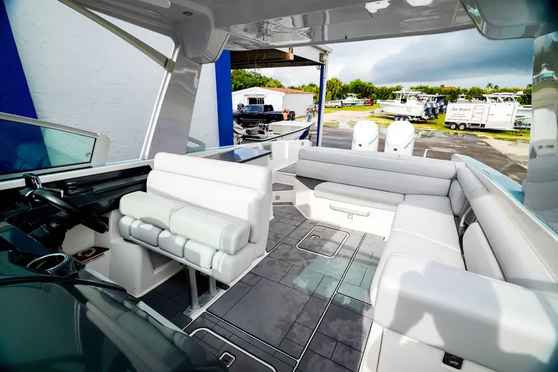 Slide: The Image of 2022 Aviara AV32 OB boat interior with sleek seating and modern design. - 4