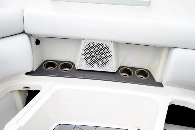 Slide: The Image of 2022 Aviara AV32 OB boat interior with cup holders and speaker. - 44