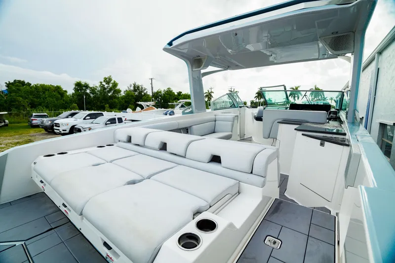 Slide: The Image of 2022 Aviara AV32 OB luxury boat with spacious seating and sleek design. - 6