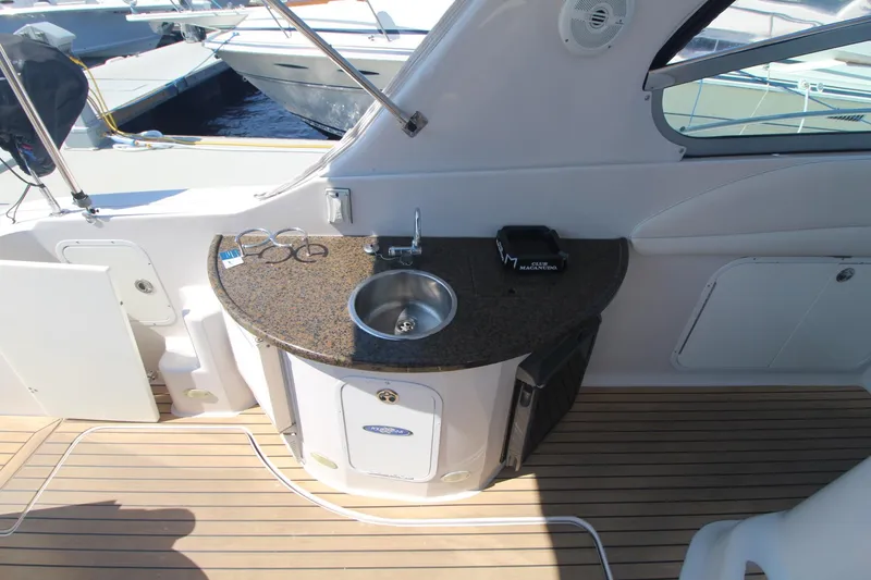 Slide: The Image of 2006 Four Winns 378 Vista yacht with outdoor sink and countertop on deck. - 16