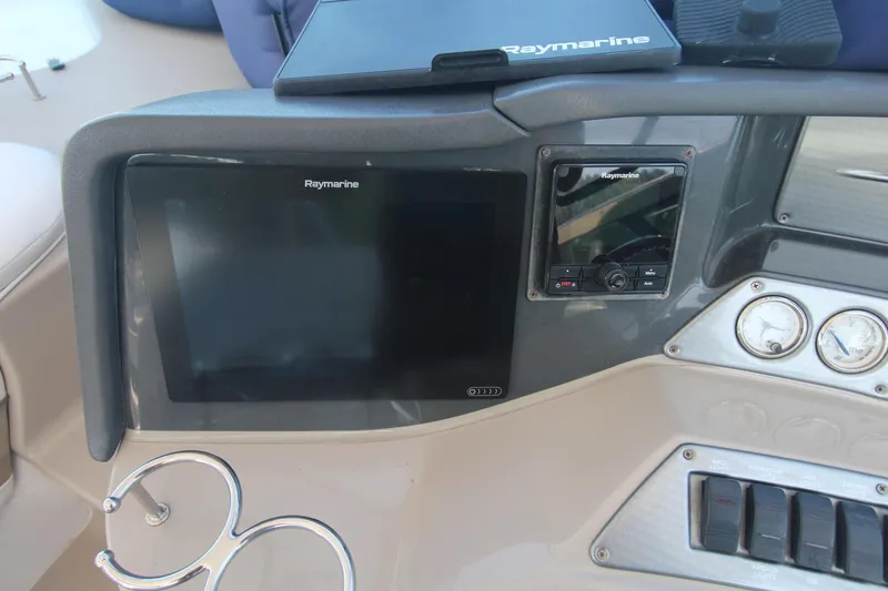 Slide: The Image of Dashboard of 2006 Four Winns 378 Vista with Raymarine navigation system. - 21