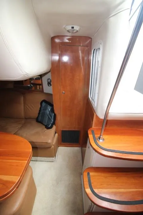 Slide: The Image of 2006 Four Winns 378 Vista interior with wood finish and leather seating. - 32